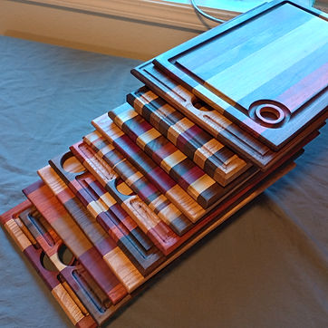 A stack of boards coming off the bench, oiled and stacked.