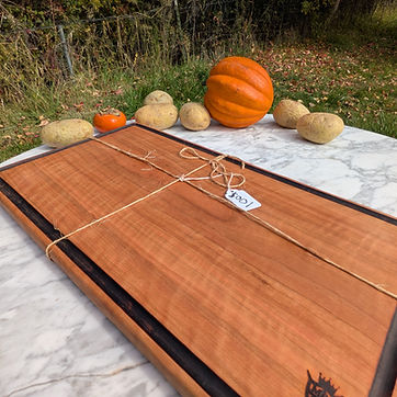 Cherry serving board, branded by hand.
