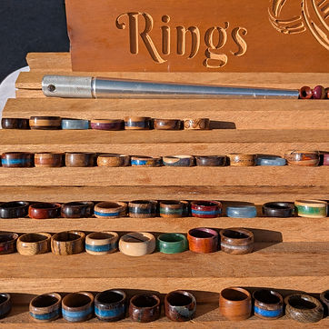 Five tiers of rings, the mandrel resting on the top shelf.