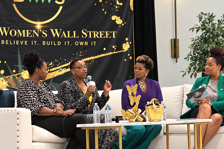 Dr. Sherman leading an intimate leadership workshop with professional women around a long table