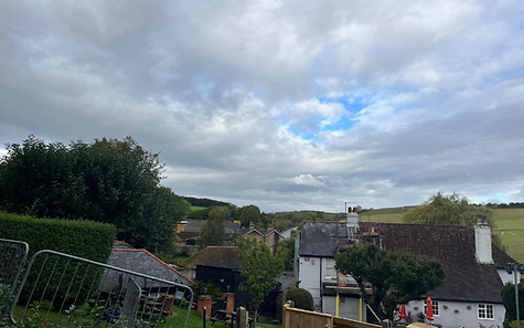 Views of Lydden village rooftops and Kent green countryside seen from the holiday lodge