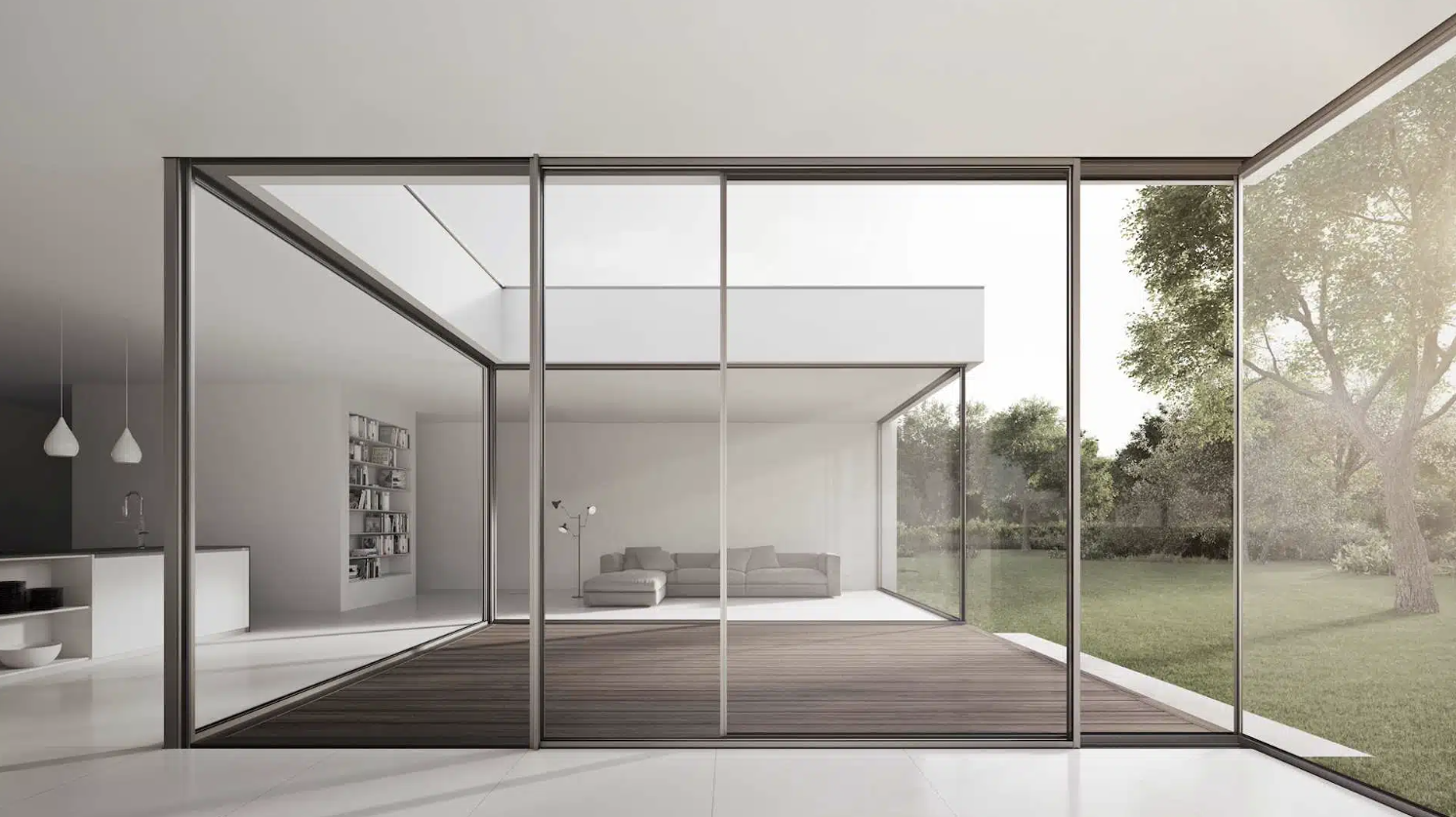 Living space with sliding doors opening onto a dark timber deck