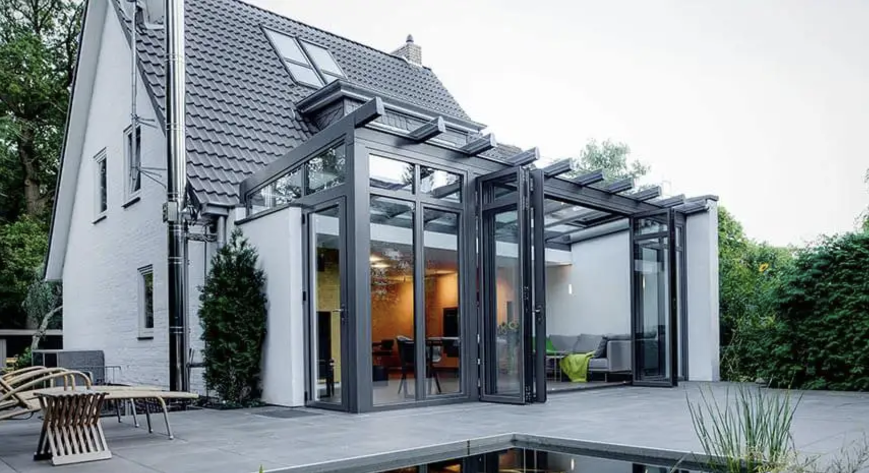 A Solarlux wintergarden with a glazed roof above a living space