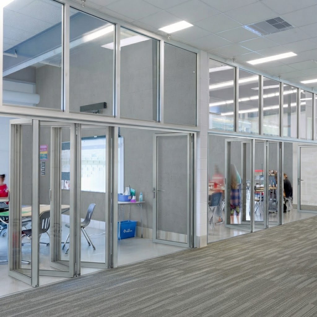 A minimal-frame horizontal sliding wall in a commercial building