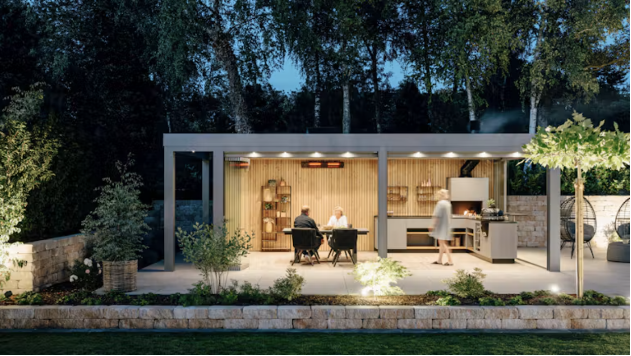 A Solarlux glass canopy sheltering an entrance in glass and aluminium