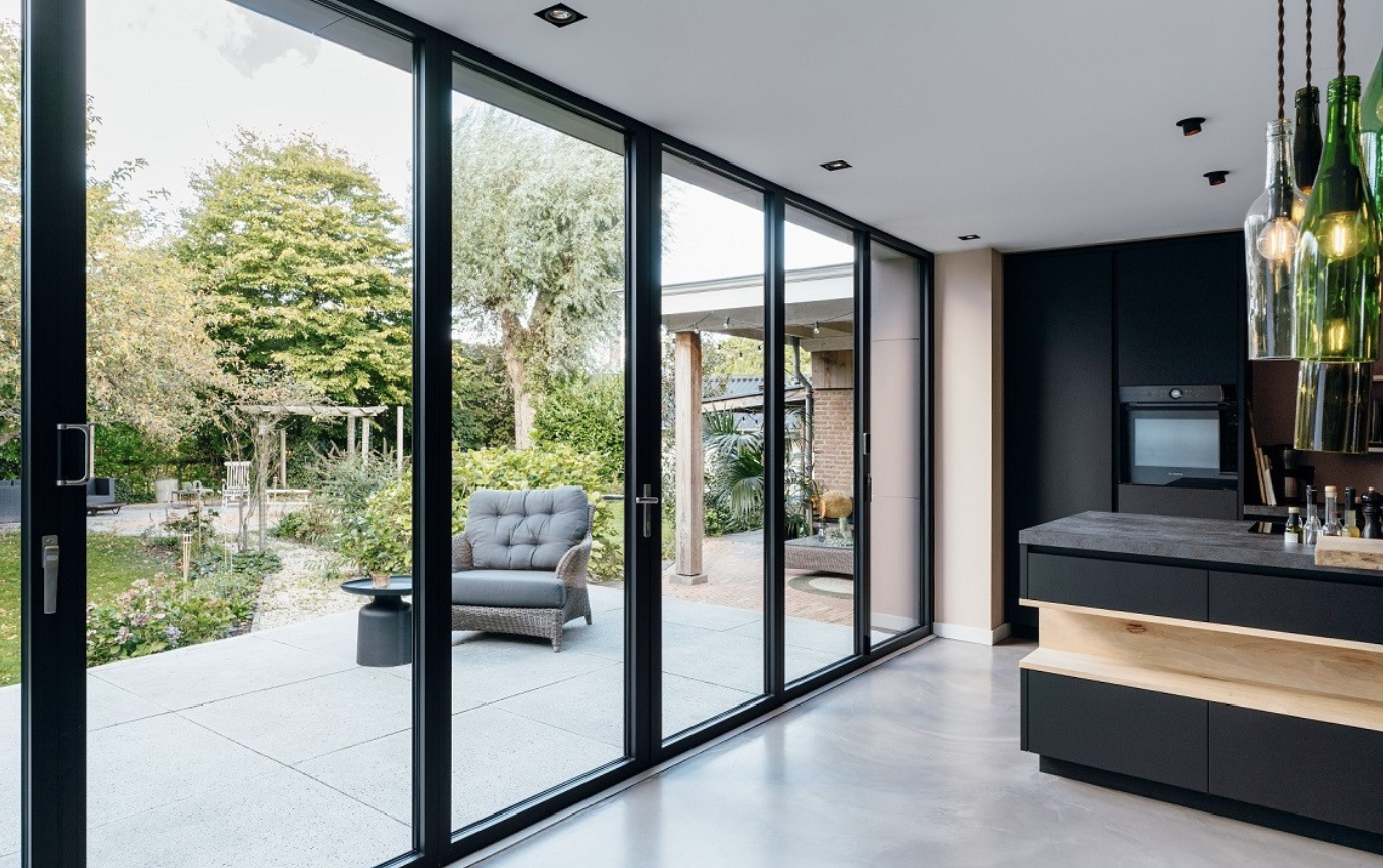 Bi-folding doors seen from a kitchen looking out to the garden