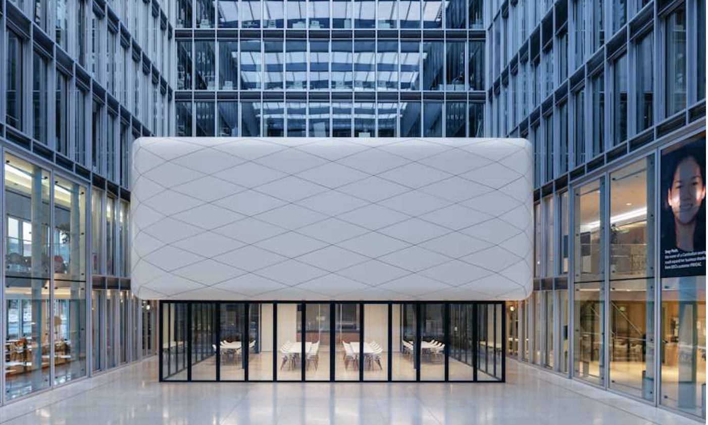 A Solarlux horizontal sliding wall opened across a commercial elevation