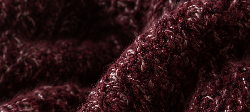 Macro detail of the EALIE oxblood knit