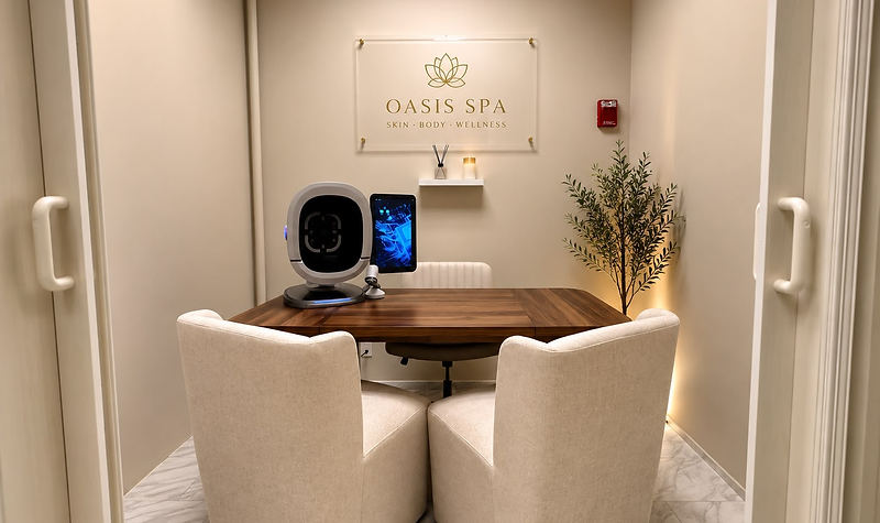 Private skin consultation room with analysis equipment and Oasis Spa signage