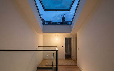 Automated rooflight over a central stairwell