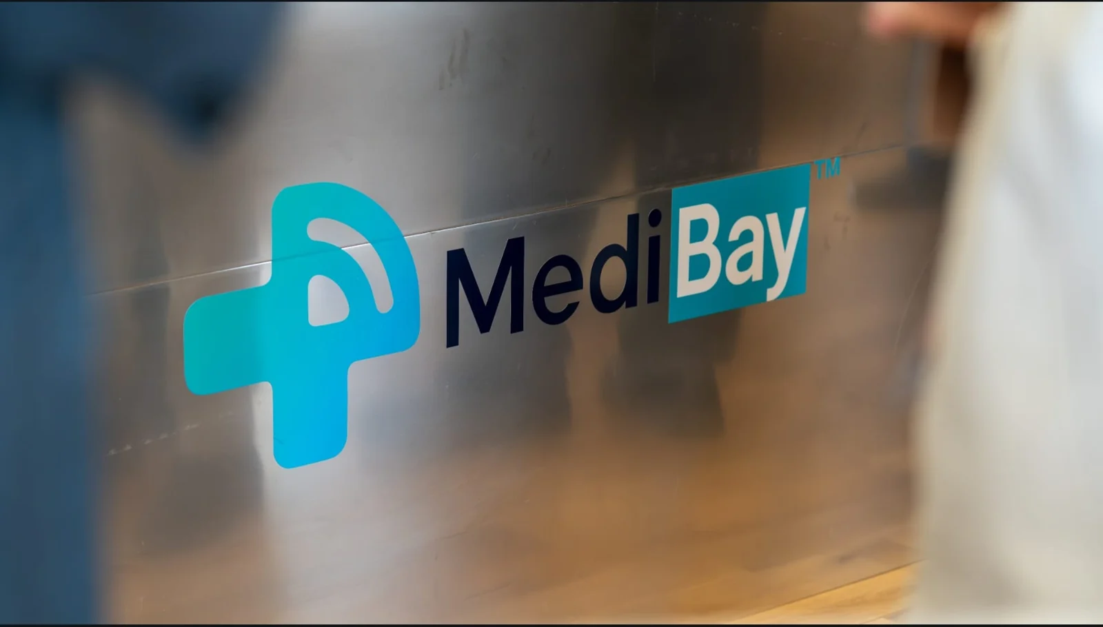 Close-up of the original MediBay branding on the steel equipment enclosure.