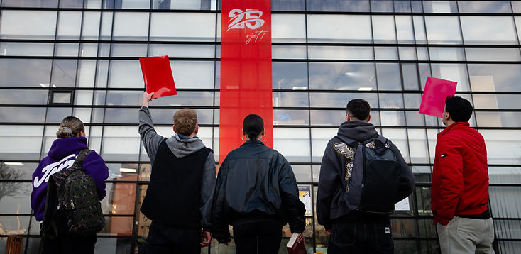 Students in front of the Kolegji AAB campus building in Fushë Kosovë