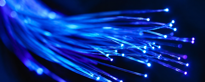Abstract macro of data flowing through fibre optic filaments