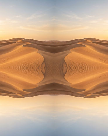 A horizontally mirrored dune ridge in warm sand tones.