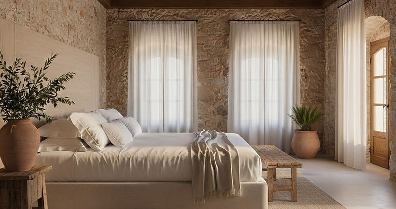 Architectural visualisation of a restored bedroom suite at Mas El Regalo: sand-coloured stone walls, two tall windows with sheer linen curtains, a large bed with white linen and a tall oak headboard, terracotta vases and exposed wooden beams. A future impression, not an existing photograph of the estate.