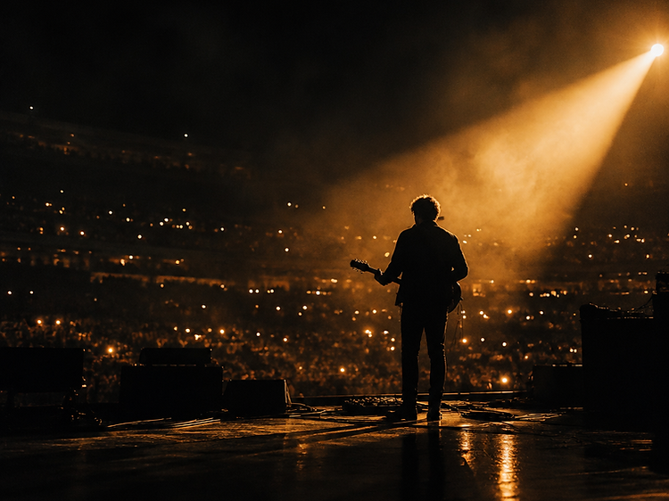 Stage lighting through haze before a performance