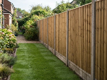 Closeboard fence on concrete posts and gravel boards