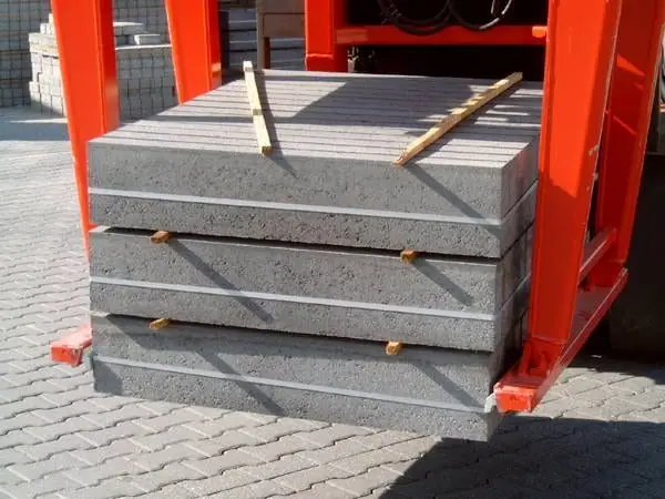 Forklift attachment for carrying slabs and loads