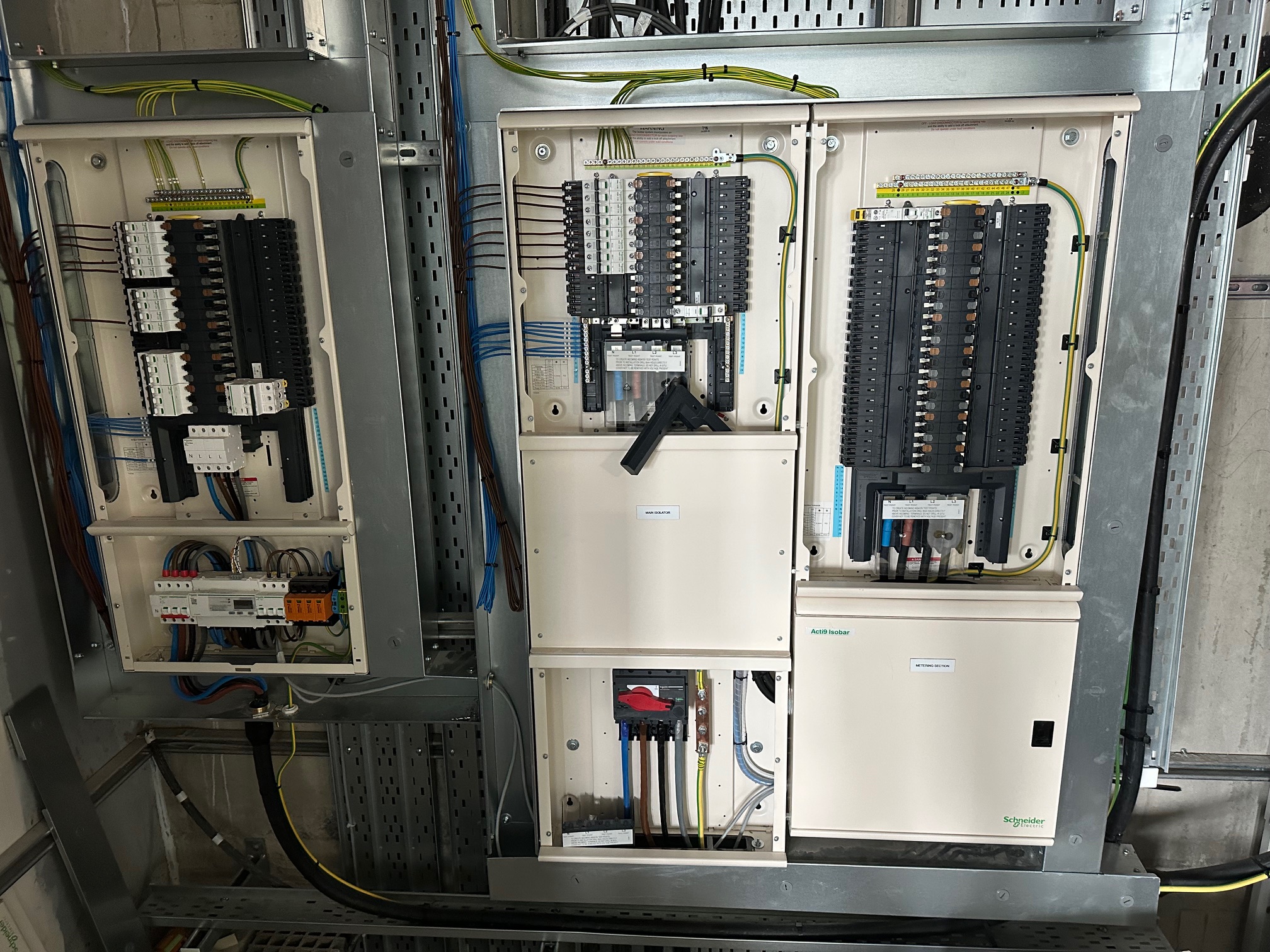 Acti9 Isobar distribution boards with main isolator and metering section mounted on a galvanised tray