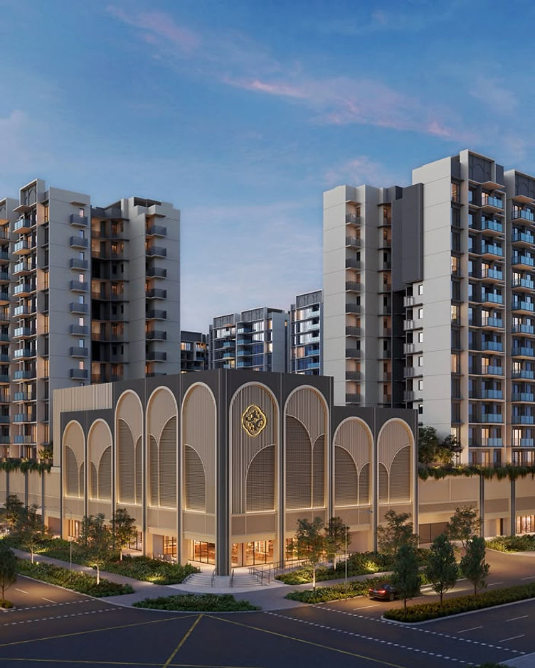 Aerial view of a modern mixed-use condominium development surrounded by greenery