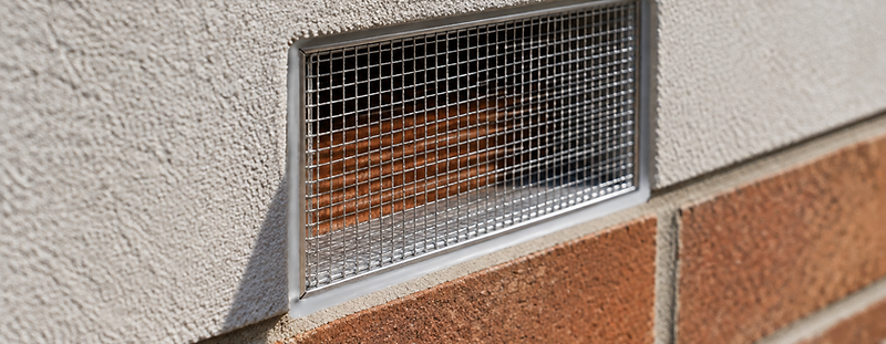 Stainless steel insect mesh fitted over a brick weep hole