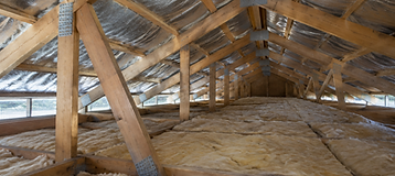 Timber roof trusses and sarking inside an accessible residential roof void