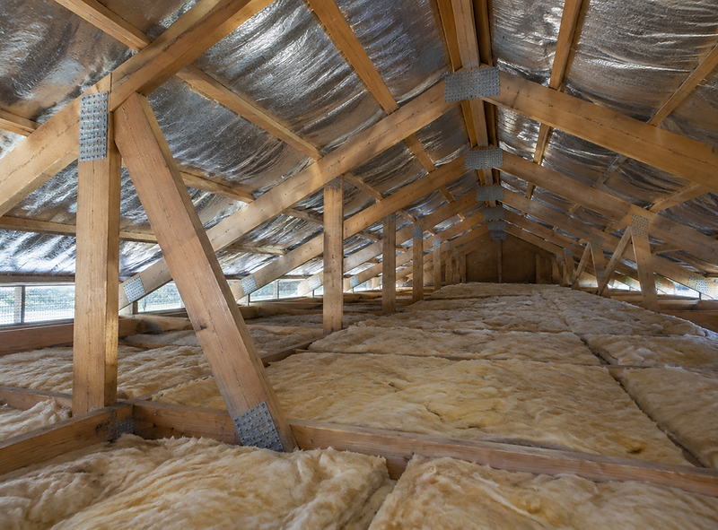 Timber roof trusses and sarking inside an accessible residential roof void