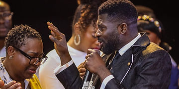 Dr Evans Oppong preaching in profile