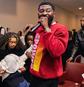 Dr Evans Oppong preaching in a Days of Power hoodie