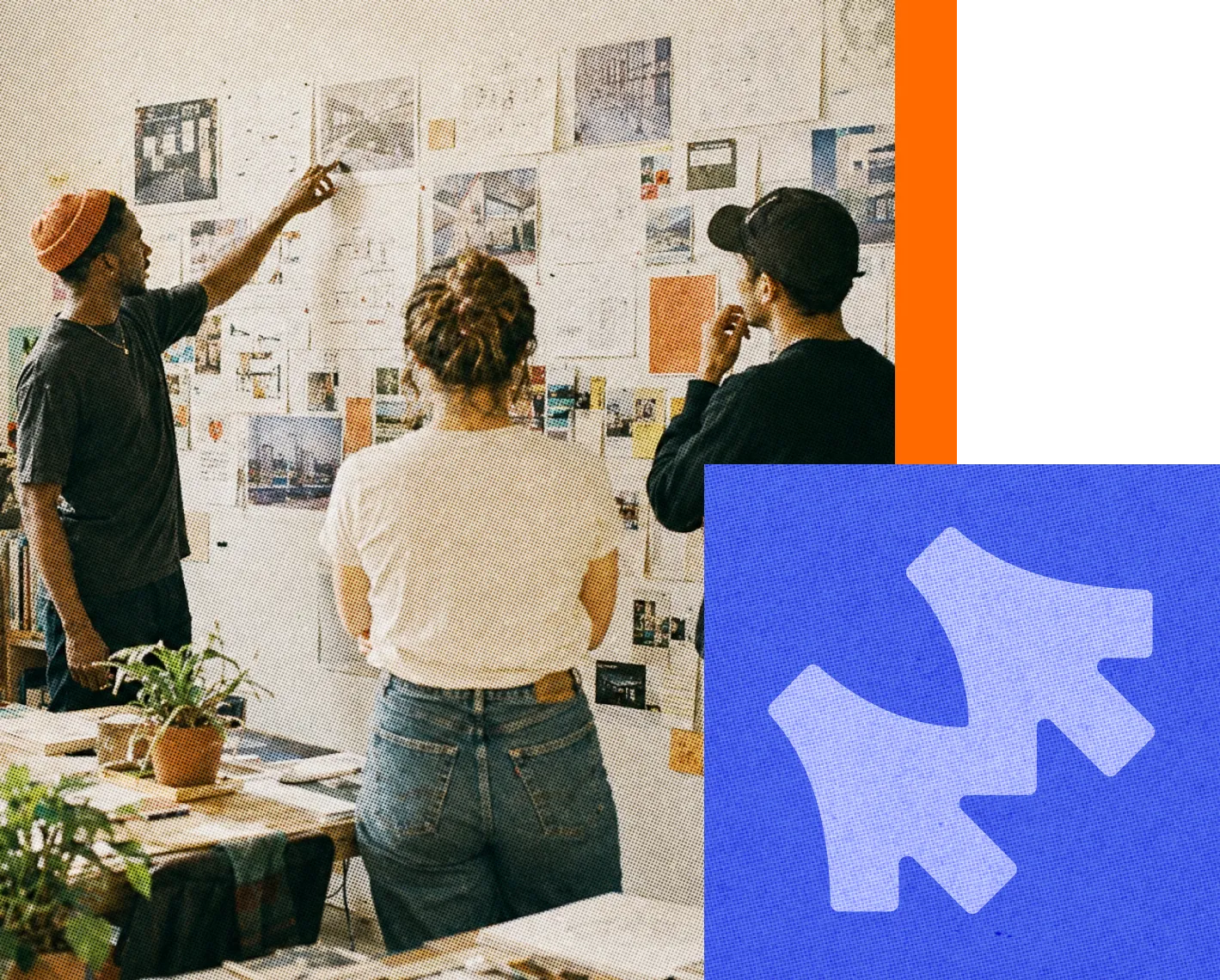 Team reviewing app designs on a studio wall