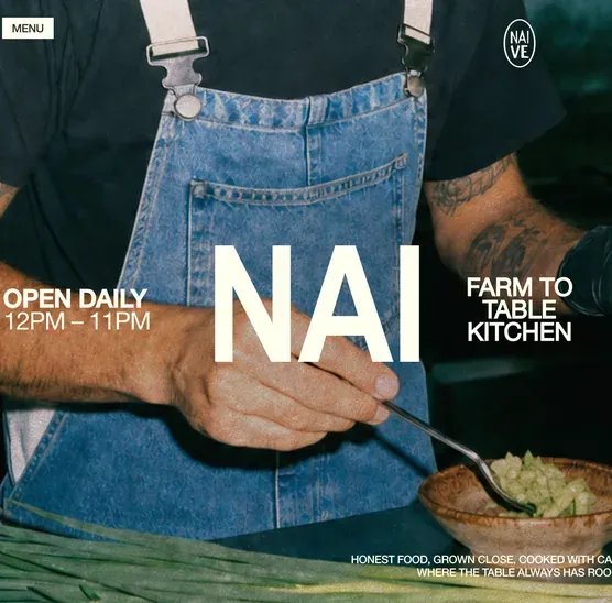 Restaurant website section with opening hours and a farm-to-table kitchen photo