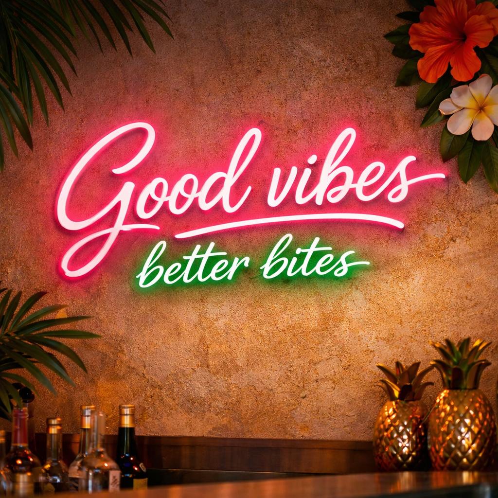 Good vibes neon sign inside BALI Cafe