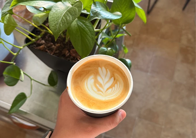 A latte, poured by hand