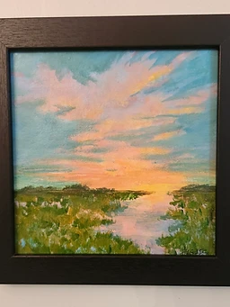 Impressionist painting of a marshland at sunset, soft peach and golden sky meeting muted olive-green grasses with reflective water.