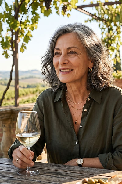 Isabella at her table in the Tuscan hills