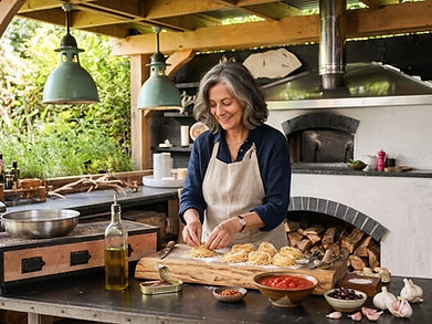 Isabella shaping fresh pasta in her outdoor kitchen