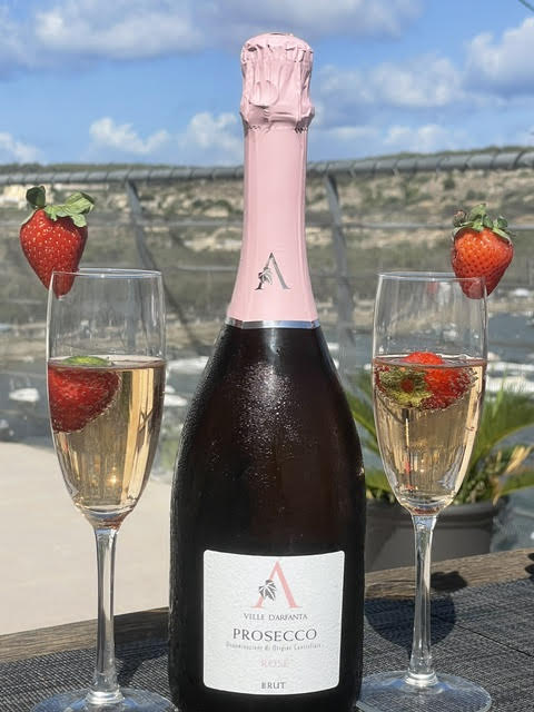 Ville D'Arfanta Prosecco Rosé served with fresh strawberries — premium wine available Malta wholesale