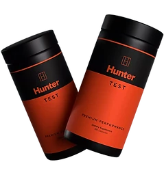 Two Hunter Test bottles in a dynamic composition on a black background