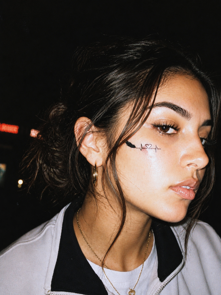 Close-up face tattoo