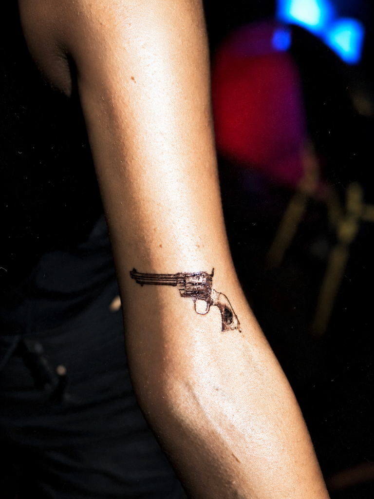 Gun forearm tattoo