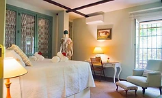 Welcoming bedroom opening onto the garden