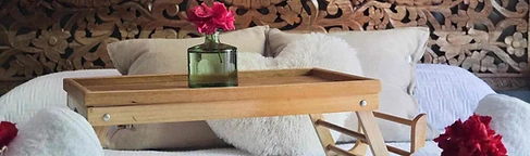 Crafted wood detail and thoughtfully prepared bed