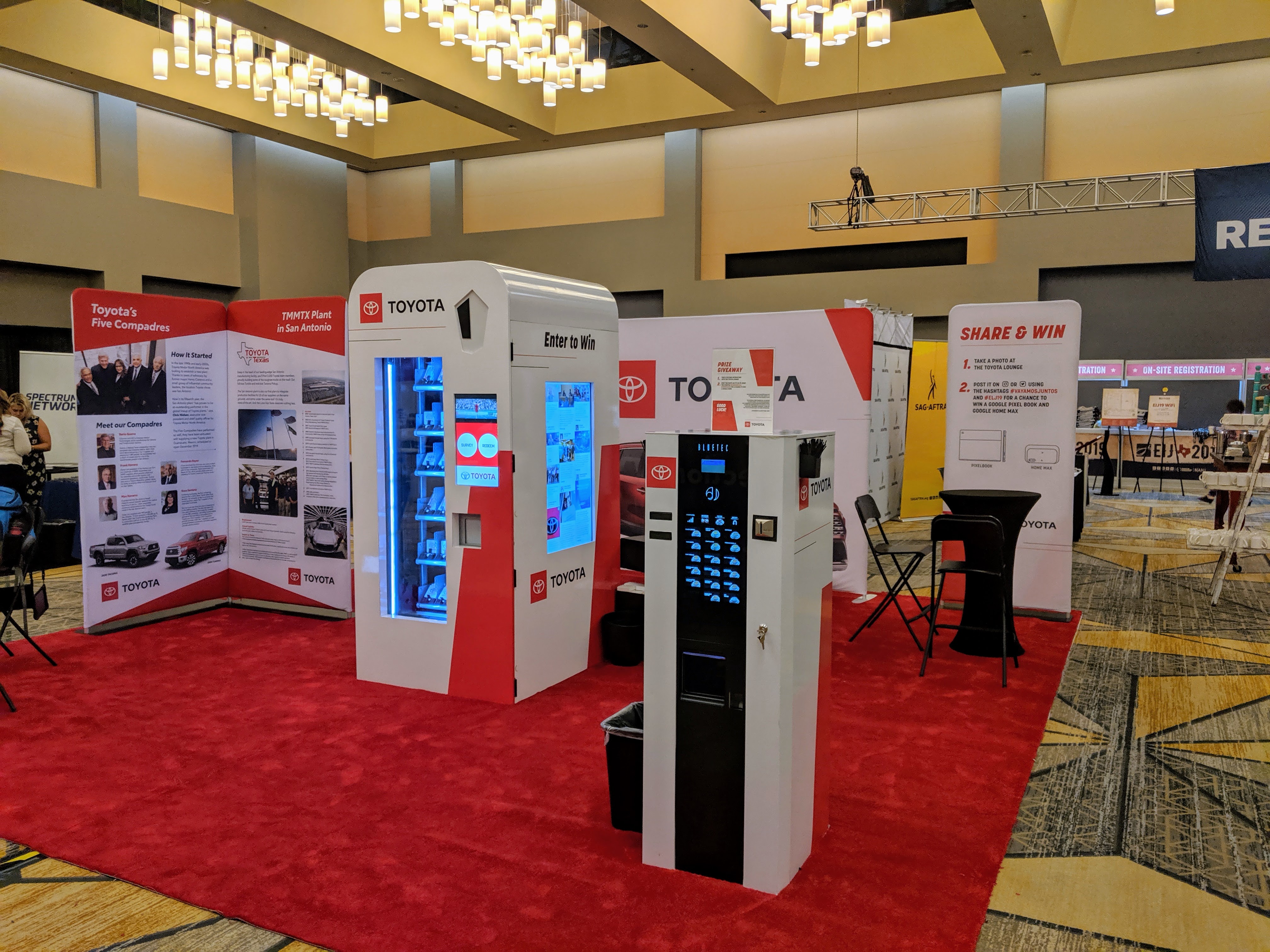 Toyota branded interactive vending and experiential installation at a conference event booth