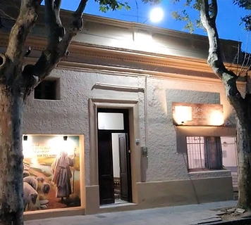 The Good Shepherd mural on the front of the church building in downtown Durazno