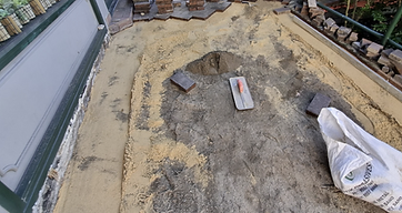 Sunken pavers being re-levelled