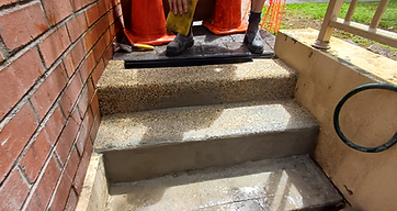 Patched pebblecrete step repair