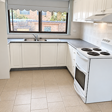 Kitchen with white cabinetry