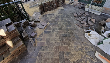 Loose pavers re-bedded on a residential path