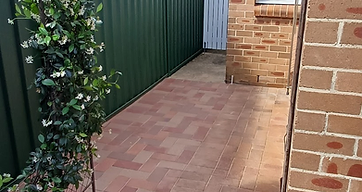 Repaired residential path and courtyard
