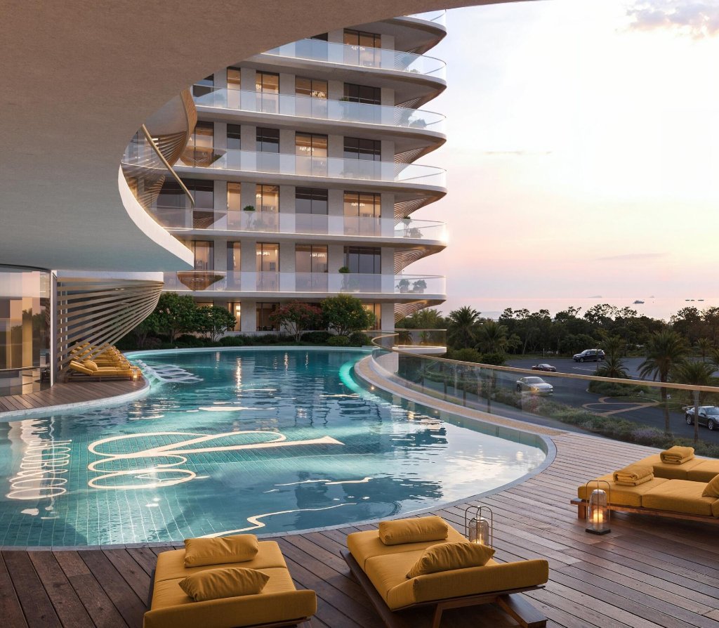 Jacob & Co. Residences lazy pool and family zone at dusk, Ras Al Khaimah